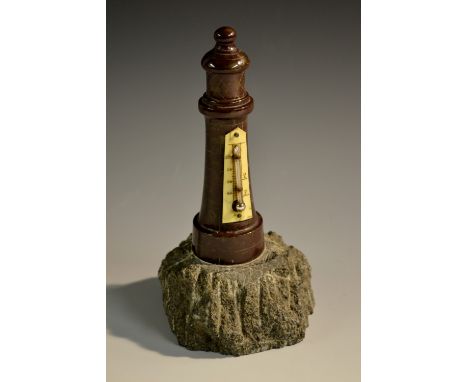An early 20th century Cornish serpentine novelty desk thermometer, as a lighthouse, 17.5cm high 