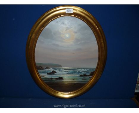 An oval framed Oil on board of seascape at sunset, signed lower left Alan Dinsdale, 23" x 19 1/2".