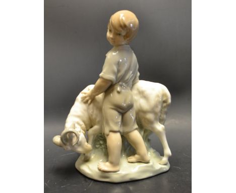 A Nao figure, boy with goat 