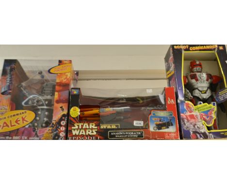 A Star Wars episode one Anakin's podracer wake-up system, boxed; a Doctor Who radio controlled Dalek, boxed; a Robot commando