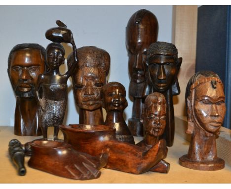 Tribal Art -  a set of eight busts of tribes men and women, part labelled Makonde Carving;  two foot dishes/ pipe stands (10)