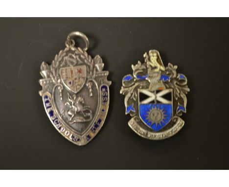 A Silver and enamel fob; another similar (2)