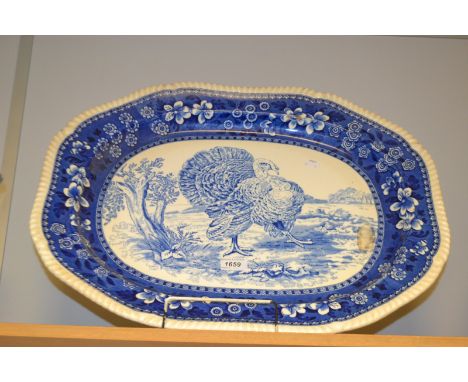 A substantial Copeland spode meat, unusually transfer printed in blue with a turkey, heraldic border, 60cm with printed marks