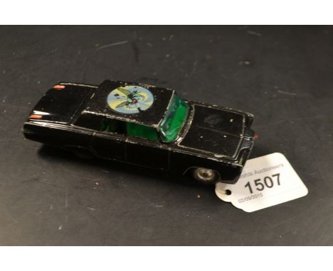 A Corgi Toys Green Hornet's Black Beauty diecast model, lacking missiles and spinners (play worn) a Crescent Toys Cap gun Rev