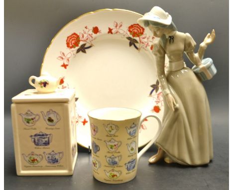 A Royal Crown Derby Bali pattern 27cm plate ; a Ringtons tea caddy ; a Spanish figure of a woman.
