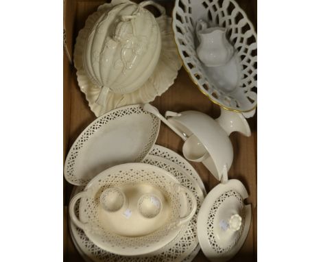 A 20th century Leeds Creamware pierced sauce tureen and ladle on stand; a Leeds Creamware pumpkin shaped tureen and cover; a 