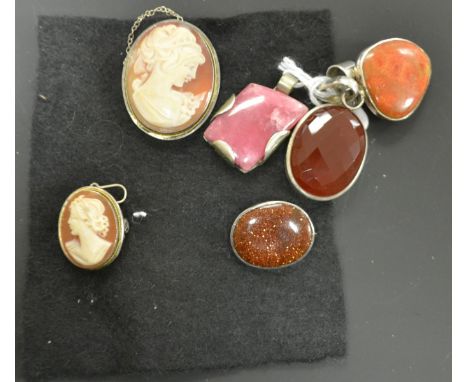 Jewellery - a faceted oval carnelian pendant, silver mount;  others Rose Quartz, orange hard stone;  an oval gold stone brooc