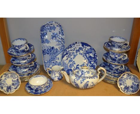 A Royal Crown Derby Mikado pattern tea set comprising tea pot, milk and sugar, six assorted cups and saucers, quantity of tea