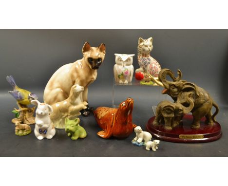 Ceramic animal and bird models - a Spanish model of a Spaniel , a large Siamese cat , an Elephant group , a Byngo style dog ;