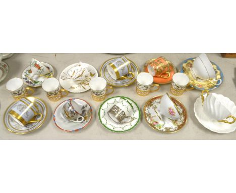 Ceramics - a pair of Minton guilt and puce coffee cans and saucers; a set of five Crown Staffordshire and gilt metal coffee c