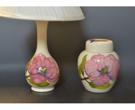 A Moorcroft pink magnolia pattern ginger jar, white ground, impressed marks, a conforming lamp base (2)