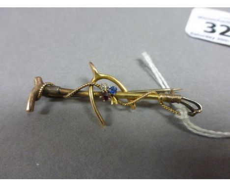 Vintage Yellow Metal Bar Brooch in the form of a Hunting Whip with Wishbone set with Three Coloured Stones