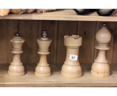 Four Unusual Treen Pepper Grinders in the form of Chess Pieces