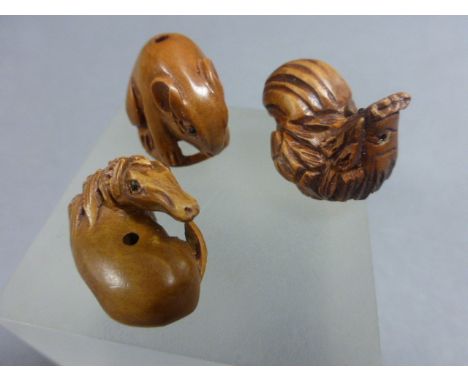 Three miniature netsuke type carvings including a horse, hen and a mouse   