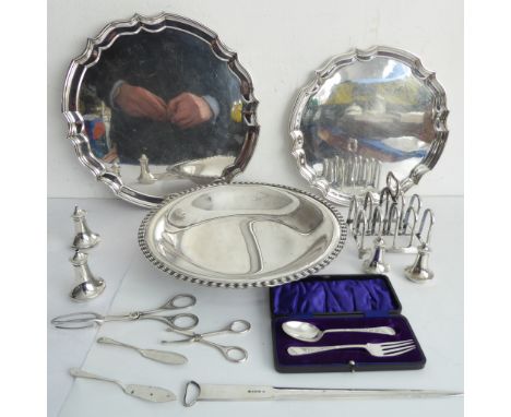 A selection to include:small silverware to include a cased hallmarked silver engraved fork and spoon set, a pair of pepperett