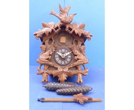 A German cuckoo clock with rack strike movement