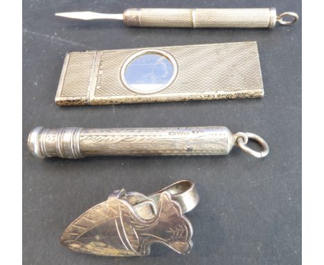 A small silver group of four:a pencil holder assayed Chester and by Villiers & Jackson;a retractable toothpick with engine-tu