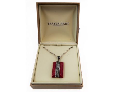 An unusual rectangular polished red hardstone and silver mounted pendant upon a silver neck chain (boxed)