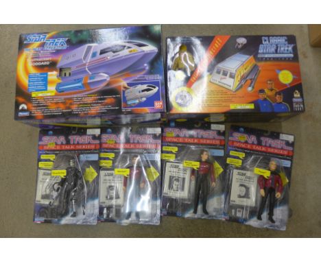 A Star Trek Classic and The Next Generation Shuttlecraft, boxed and four Star Trek figures, unopened 