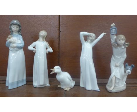 A collection of one Lladro and four Nao figures, one boxed 