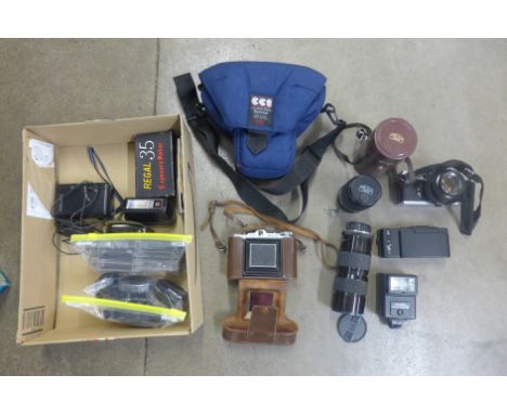 A Minolta XD7 and Olympus XA4 cameras, Mitakon and Carl Zeiss lenses, other camera equipment, filters and bag, etc. 