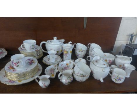 A collection of Royal Crown Derby, Derby Posies china, nine cups and saucers, eight tea plates, six pin dishes, two teapots, 