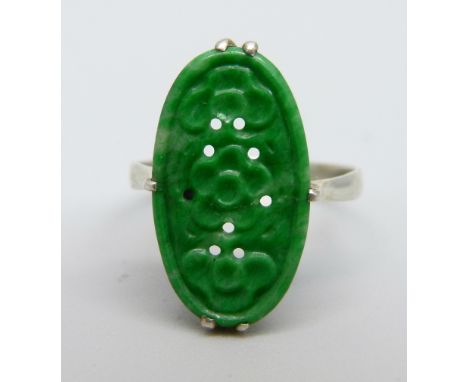 A white metal and carved jade ring, M 