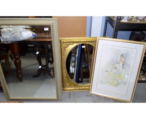 Five decorative mirrors together with a print of a lady.