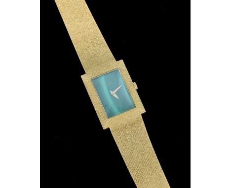 Kutchinsky gold watch, the square face with enamelled ' malacite' decoration on gold strap, marked 750 and 18 ct and K LD, in