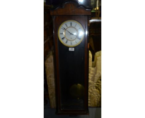 Late 19th Century single train wall clock, white enamel dial with Roman numerals.