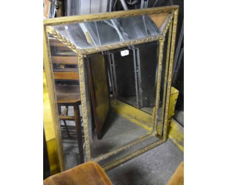19th Century gilt wood framed, cushion shaped mirror.  95cm x 77cm (a/f)