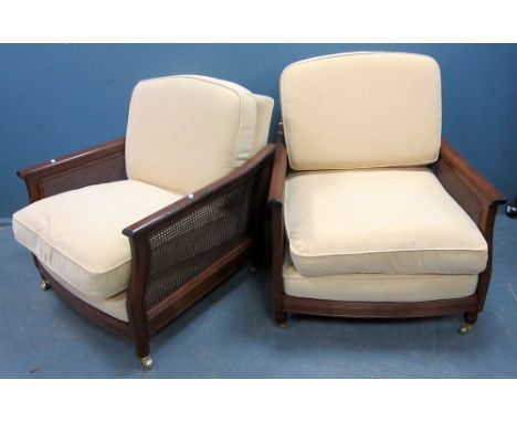 Ercol bergere two seater sofa and pair of armchairs,