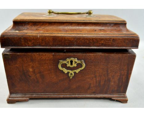 Mahogany sarcophagus shaped tea caddy.