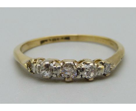 An 18ct gold, platinum set five stone diamond ring, 1.8g, N 