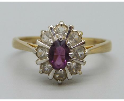 An amethyst and white stone cluster ring, T 