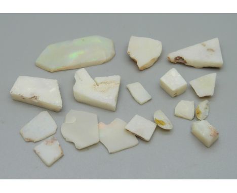 A collection of opal pieces, broken plaques 