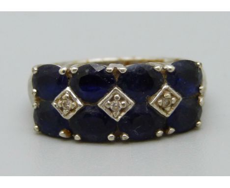 A 9ct gold white ring set with blue and white stones, 5g, N 