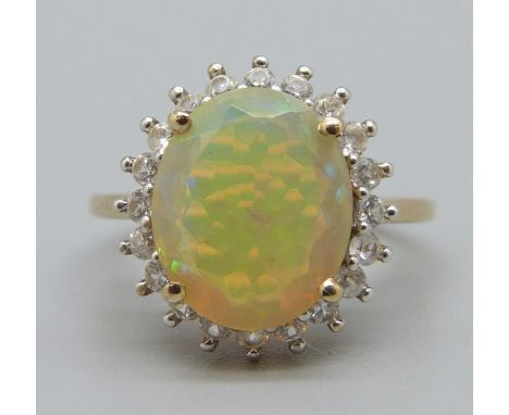 A 9ct gold, Ethiopian opal and zircon ring, O, with certificate 