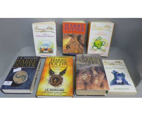 Seven Harry Potter novels, one first edition 