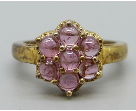 A silver gilt and pink tourmaline ring, N, with certificate, gilt worn 