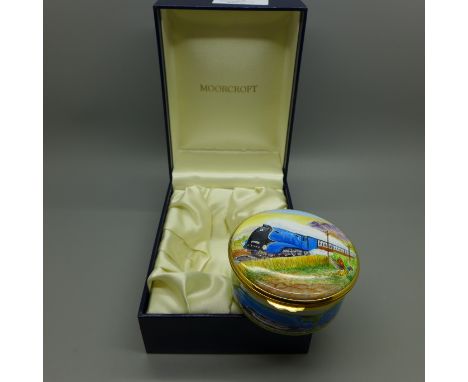 A Moorcroft enamel circular box, locomotive, 7.2cm, (Mallard depicted but named flying Scotsman) limited edition 27/50, signe