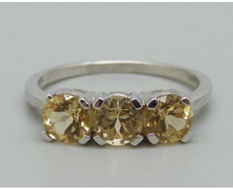 A 9ct white gold, Imperial topaz ring, N, with certificate 