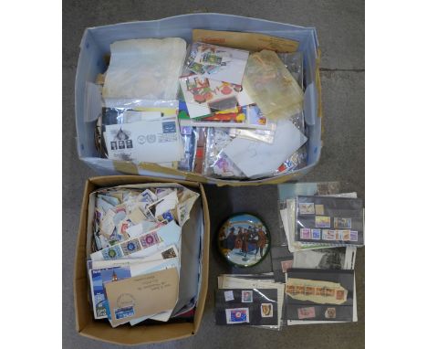 Two boxes of loose stamps, first day covers, etc. 