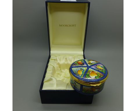 A Moorcroft enamel circular box, British Birds, limited edition 75/150, signed FW, boxed 