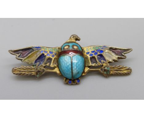An 800 silver and enamel Egyptian Revival brooch, some enamel lacking, with a box