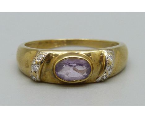 A 9ct gold, amethyst and diamond ring, 2.3g, M 