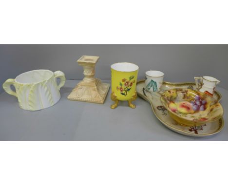 A collection of early Royal Worcester; candlestick, trefoil tray, two pots, a jug and cup in similar pattern, and hand painte