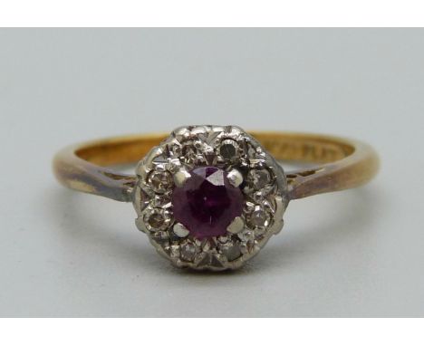 An 18ct gold, platinum, ruby and diamond cluster ring, 3.1g, N 