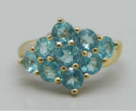 A silver gilt Madagascan blue apatite ring, O, with certificate 