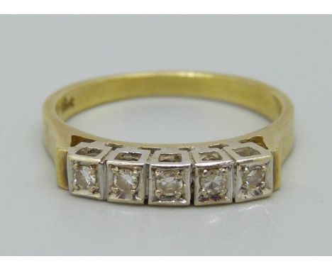 An 18ct gold, five stone diamond ring, 3.1g, L 